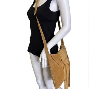70s style crossbody tan suede bag with fringe
